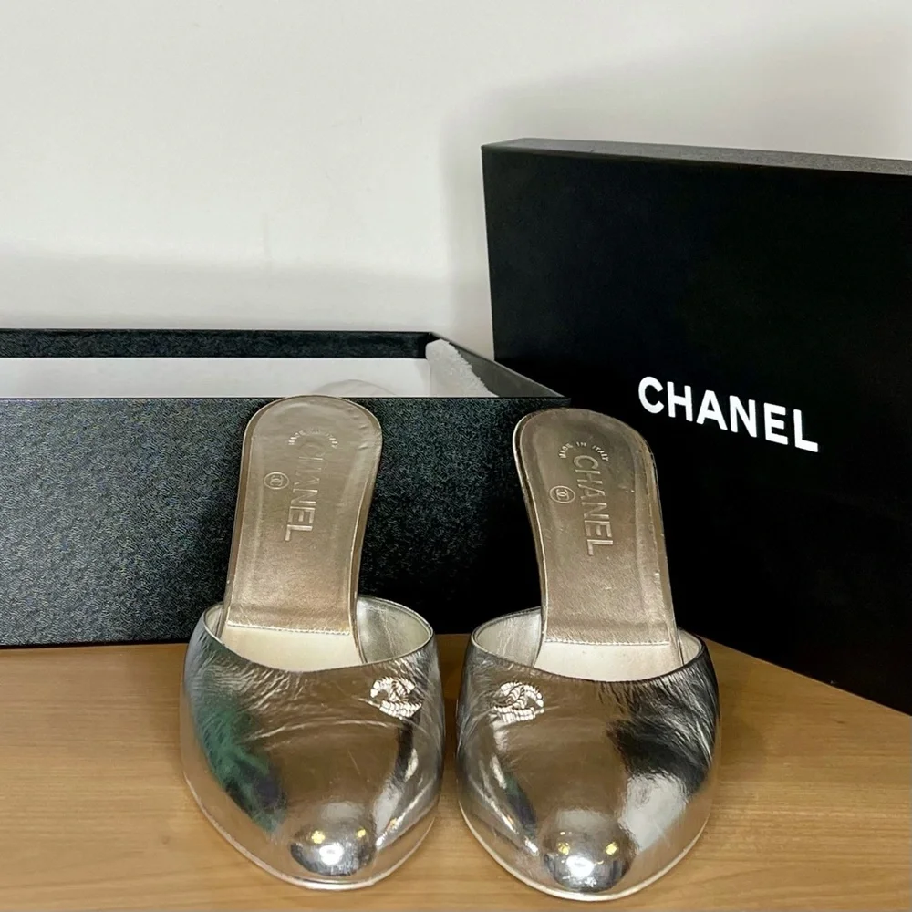 Chanel silver mules